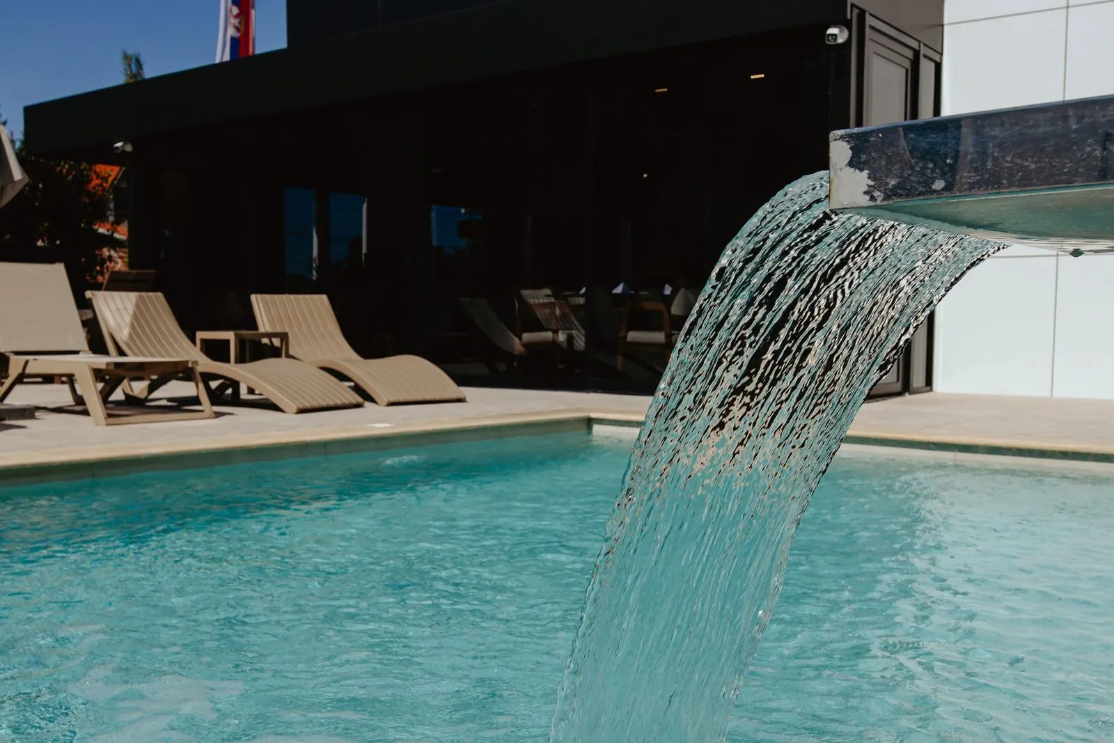 Waterfall flowing into the pool