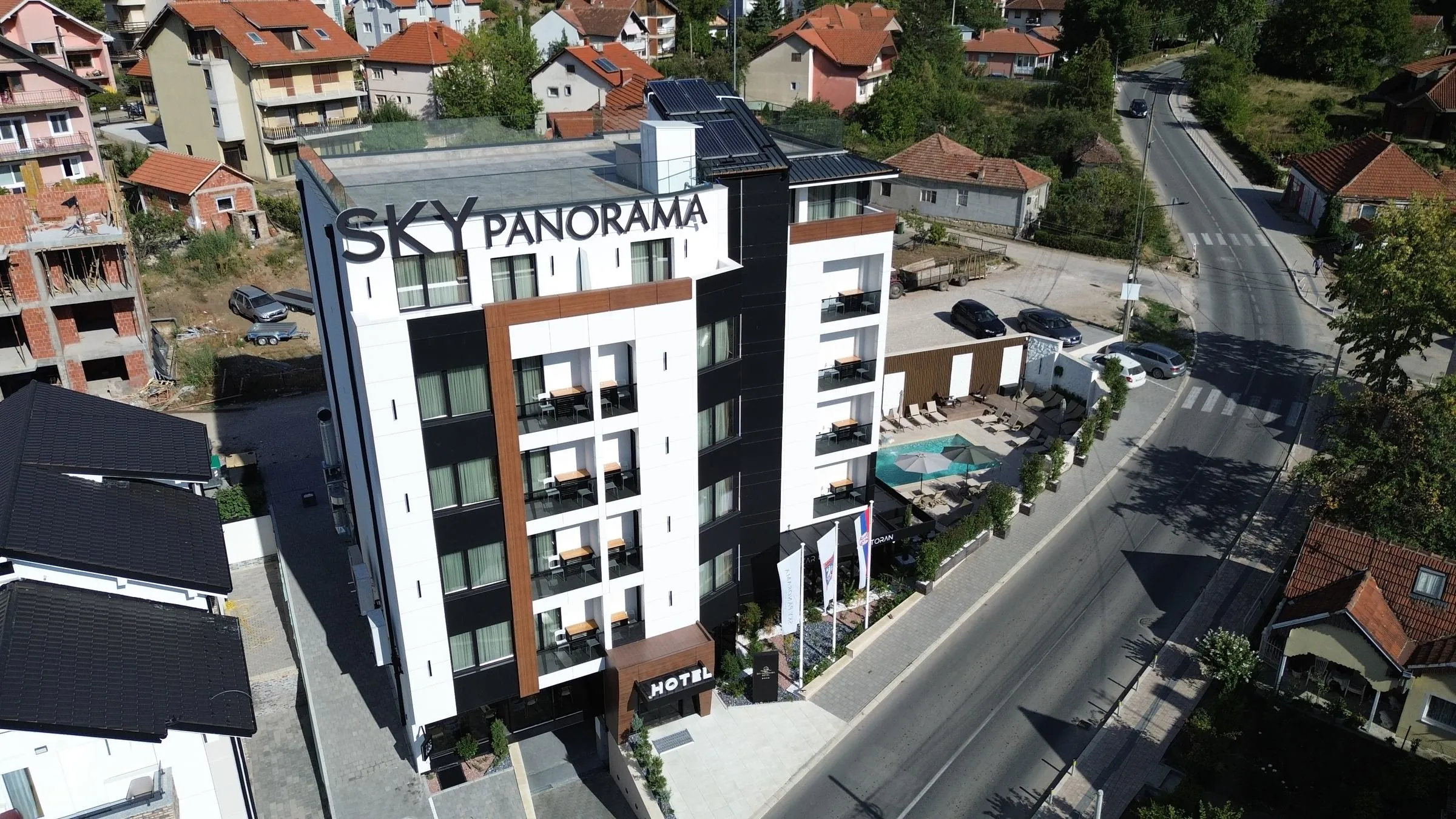 Hotel Sky Panorama from the air, with the street in front of the entrance