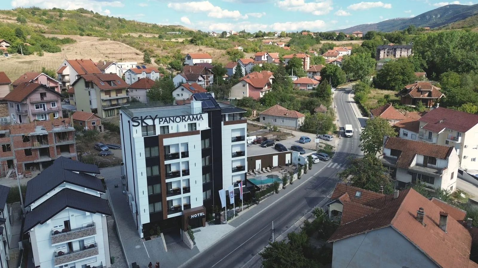 Hotel Sky Panorama from the air, with the street and the hills above Sokobanja