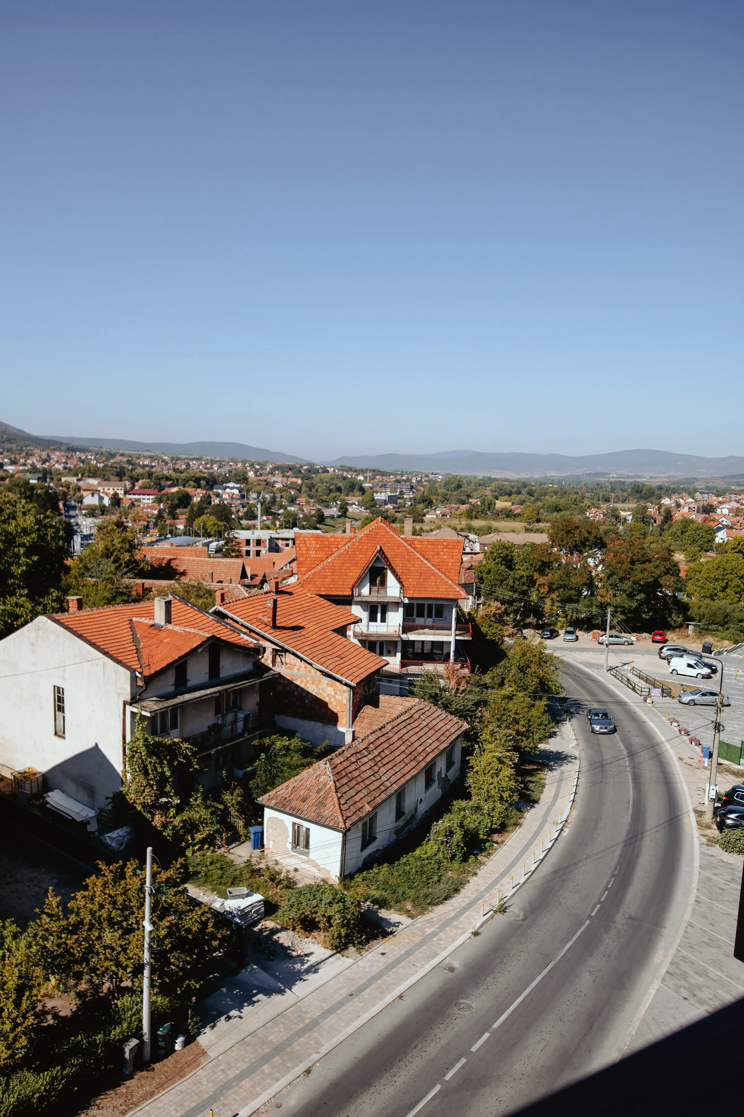 The rooftops of Sokobanja and mountains on the horizon, seen from the hotel