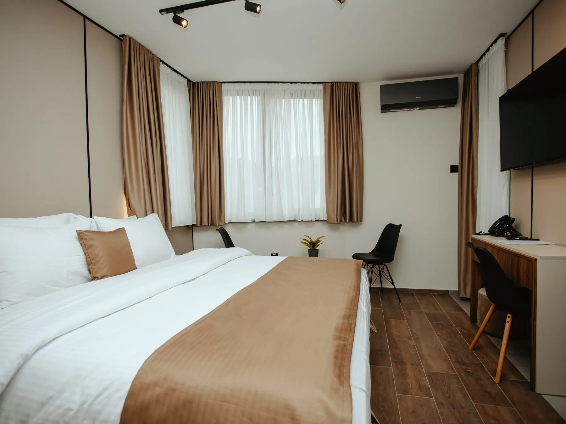 Double studio with a double bed, desk and TV