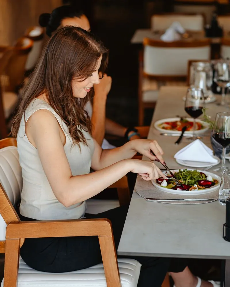 A guest at a table in the dining room