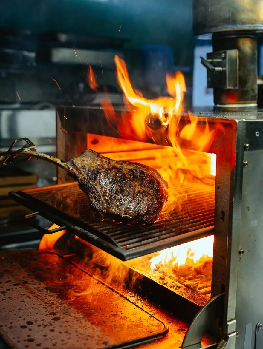 Tomahawk steak in the Josper oven, over a charcoal flame