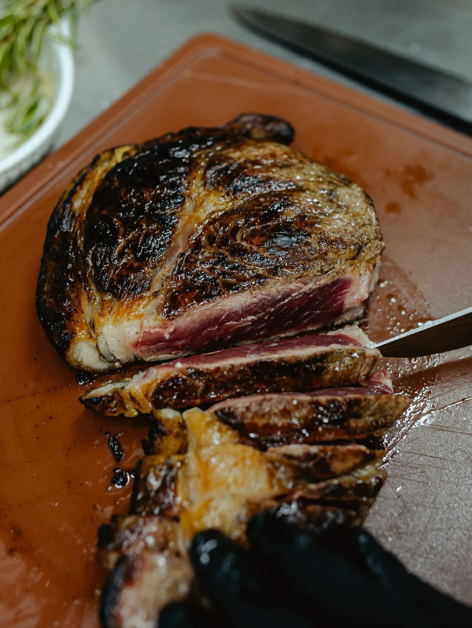 Sliced steak on a board